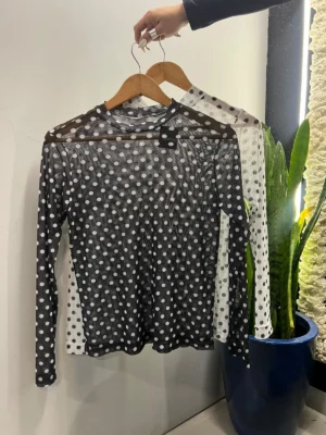 Blusa de Tule Poa
